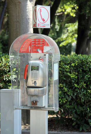 Venice, VE - Italy. 14th July, 2015: old Italian phone booth of Telecom Italia Company working with token or magnetic card, now out of order in the Sant'Elena Islandのeditorial素材