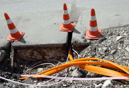 Road construction with pipes for laying optical fiber for high speed internetの写真素材