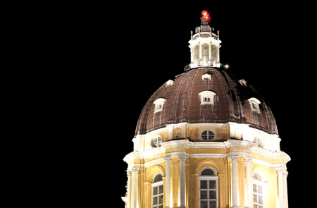 Night and the illuminated Dome of the Cathedral of SUPERGA near Turin in Italy by night