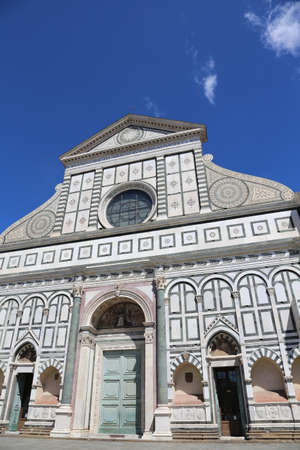 Florence Italy decorated facade of ancient Church called Santa Maria Novella near the train station of Florenceのeditorial素材