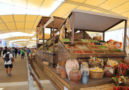 Milan, Italy - 8th September, 2015. International Exposition EXPO MILANO 2015. Main street called Decumano with fruitsのeditorial素材