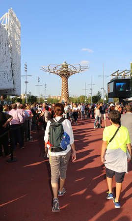 Milan, Italy - 8th September, 2015. EXPO MILANO 2015. Tree of Life in the lake Arena and people walking in the main street called CARDOのeditorial素材