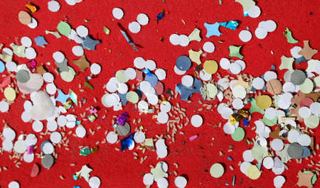 background of confetti and rice on the red carpet after the great partyの写真素材
