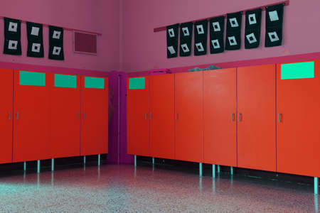 changing rooms and red lockers of kindergarten for childrenの写真素材