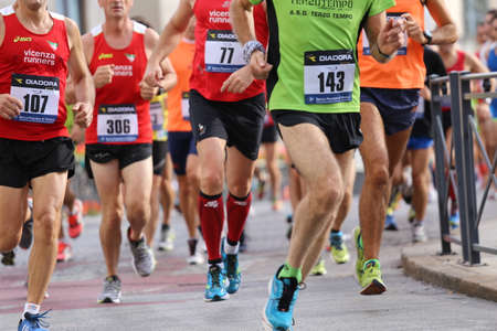 Vicenza, VI, Italy. 20th September 2015.  Marathon runners during the race called "Mezza di Vicenza" in city street of Vicenza in Northern Italy. The runners have raced meters 21097のeditorial素材