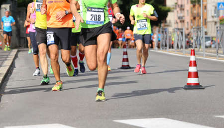 Vicenza, Italy. 20th September 2015.  Marathon runners during the race called "Mezza di Vicenza" in city street of Vicenza in Northern Italy.The runners have raced meters 21097のeditorial素材