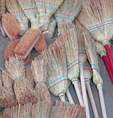 brooms and brushes of sorghum in retail marketの写真素材