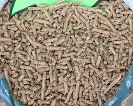 many pieces of wood called wood pellets heat up in winter with wood stove