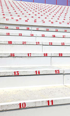 numbered steps in stands of reinforced concrete of modern stadium before the sporting eventの写真素材
