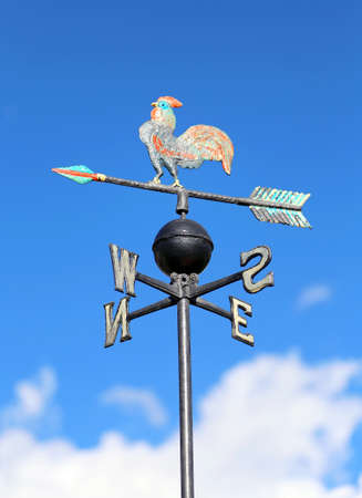 vintage wind vane for measuring wind direction with the cardinal pointsの写真素材