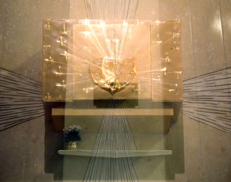 Golden Tabernacle with consecrated hosts with blur effectの写真素材