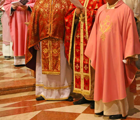 Vicenza (VI) Italy. 12 December 2015. Priests and bishops with the cassock during Mass for the opening of the Holy Door in the Cathedralのeditorial素材