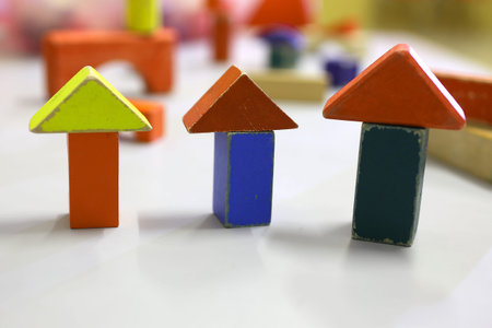 wooden toys and little pieces of buildings in the kindergarten classroom