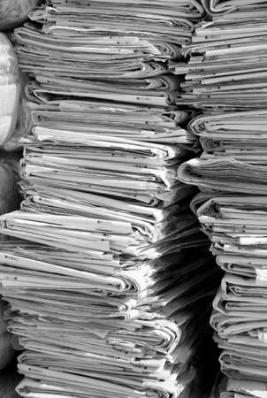 bunch of many newspapers used ready to be thrown in the waste paperの写真素材
