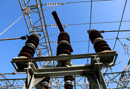 bottom view of big electric switch in an electrical substation hydroelectric
