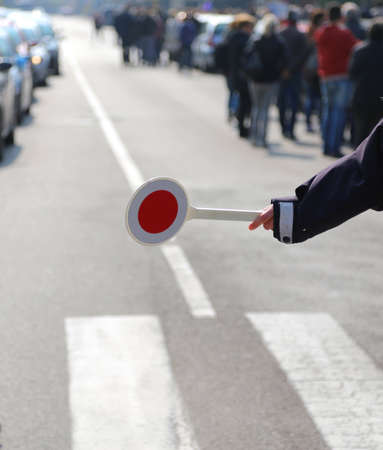 road block policeman during a traffic control in the cityの写真素材