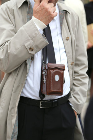photojournalist with antique camera and vintage clothes
