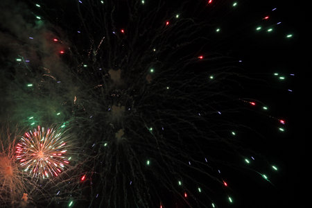 show with large colorful fireworks in the dark sky