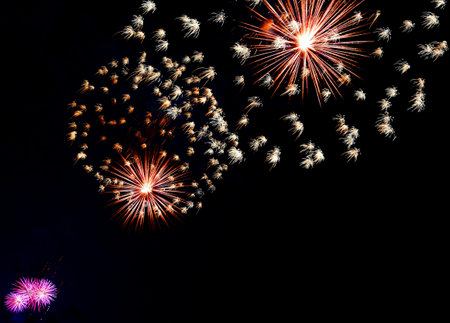 show with large colorful fireworks in the dark sky