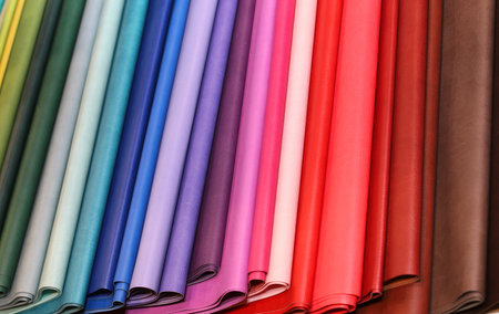 background of many pieces of colored leather
