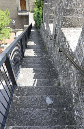 long staircase leading down from the tower of the medieval castle in Europe