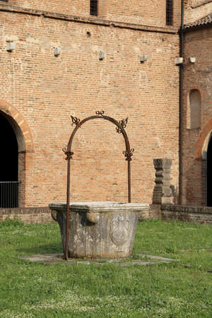 old well to collect rain water in the Pomposa Abbey in Italyのeditorial素材