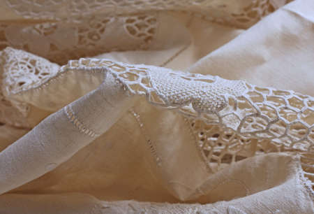detail of a sheet decorated with lace and embroidery in Burano in the province of Venice in Italyの写真素材