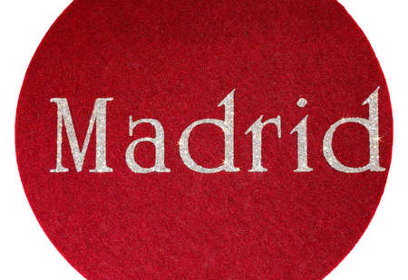 Madrid written of a Spanish city on fabric background and characters in glitter gleamingの写真素材