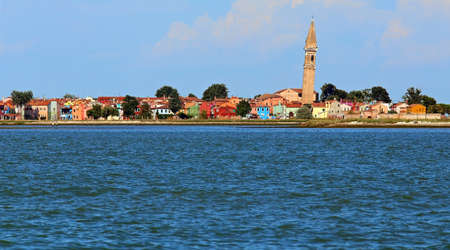 spectacular view of the island of Burano by boat in the seaの写真素材
