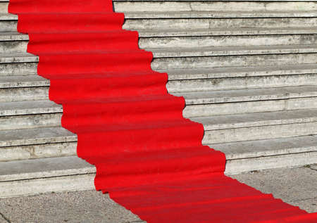 elegant red carpet on the wide steps of historic buildingの写真素材