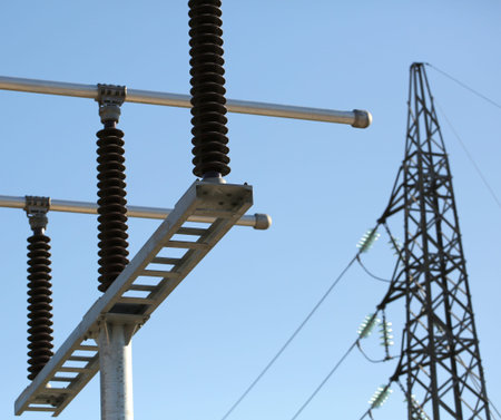 huge disconnects in a hydroelectric power plant and high voltage pylon
