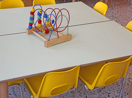 yellow chairs with small benches inside a daycare
