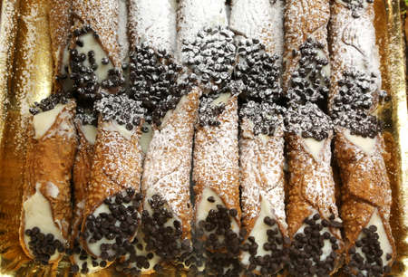 Sicilian pastry with many cannoli cream and dark chocolate chipsの写真素材