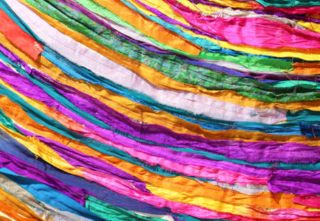 colored background of many fabrics of cotton and syntheticの写真素材