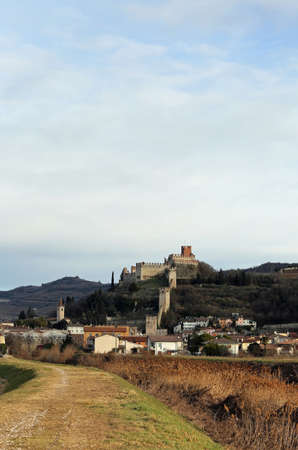 Ancient Castle of Soave with medieval walls and the ancient tower in Province of Verona Italyのeditorial素材
