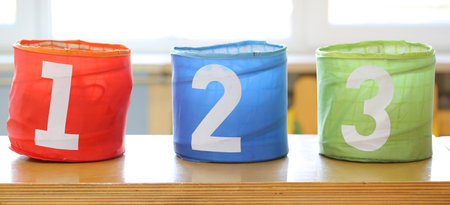 three jars for toys with numbers one two three