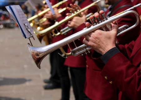 many of the band trumpet players during an outdoor exhibitionの写真素材