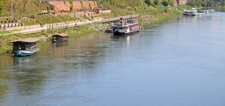 boats and the ticino river from the ancient wooden bridge