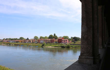 houses and the ticino river from the ancient wooden bridgeの写真素材