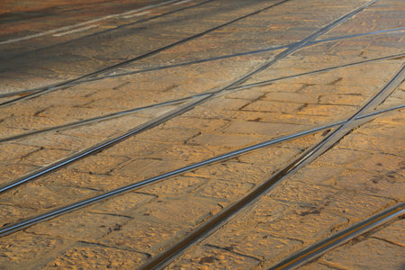 background with many iron rails of the tramway in the European metropolis