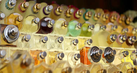 many perfume bottles in the company that makes perfumes and fragrances for men and womenの写真素材
