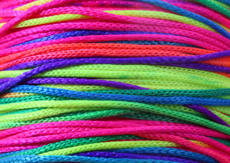 multi-colored background with string band, green, red, yellow