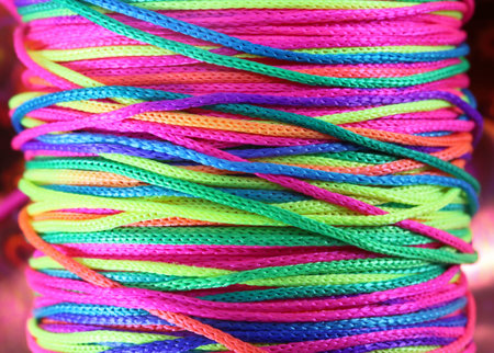rainbow  background with string band green red phosphorescent yellow