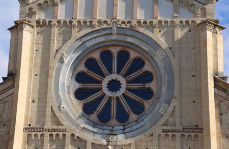 Rose window in the facade of the Basilica of San Zeno in Verona in Italy with the Wheel of Fortune...