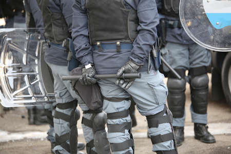 police in riot gear during the anti-terrorism control in the cityの写真素材