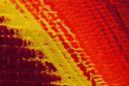 detail of a work by tissue staining with warm tones and yellow line