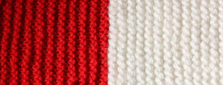 background of Red and White wool of a dress made by handの写真素材