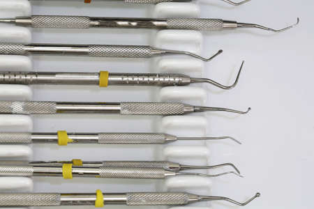 Expensive dental tools for tooth cleaning and caries control and the retention of tartare in the dental clinicの写真素材