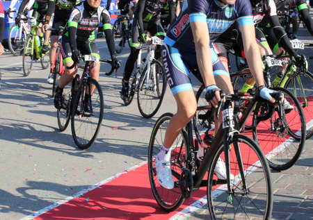 Vicenza, VI, Italy - April 30, 2017: Group of cyclists with racing bikes during the start of the bicycle race called GranFondoLiotto on the roadのeditorial素材