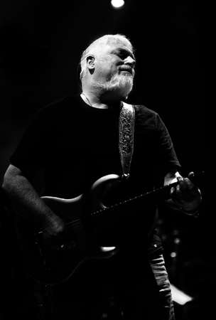 Bassano del Grappa, VI, Italy - April 29, 2017: Falzone Cico guitar player of Nomadi an Italian Musical Group on stage during a live concertのeditorial素材